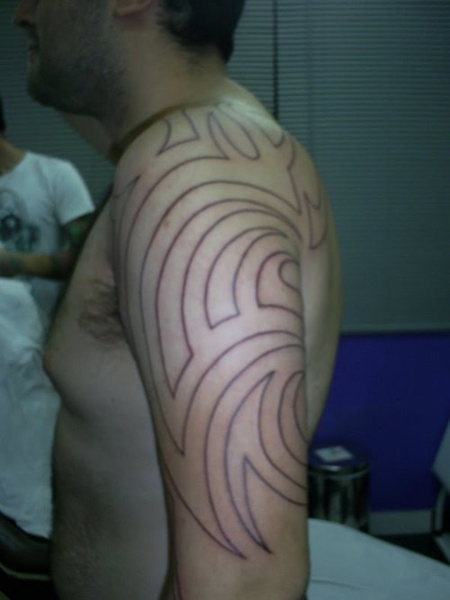 So you've decided that you want a tribal biomechanical tattoo